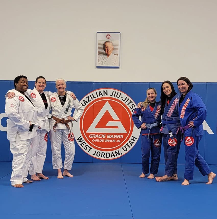 Professor Andrea and part of women's only class posing at Gracie Barra West Jordan