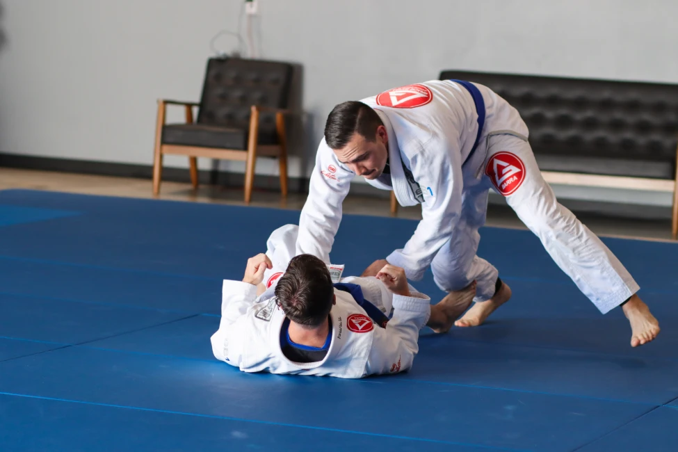 two men practicing Jiu-Jitsu at Gracie Barra Riverton