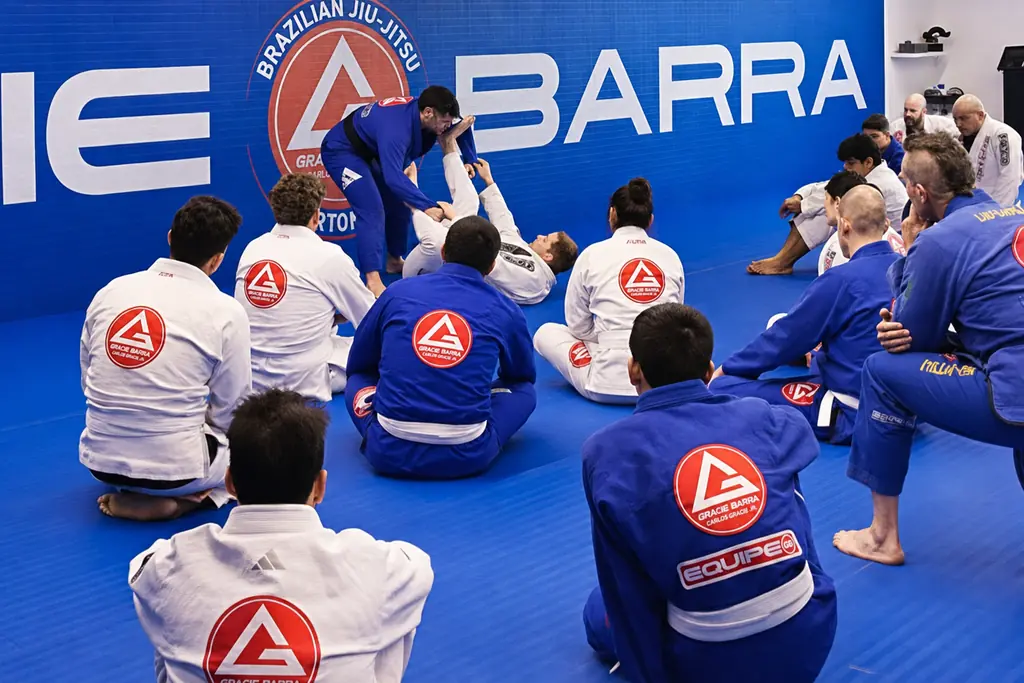 A Brazilian Jiu-Jitsu class training on the mats at Gracie Barra Riverton