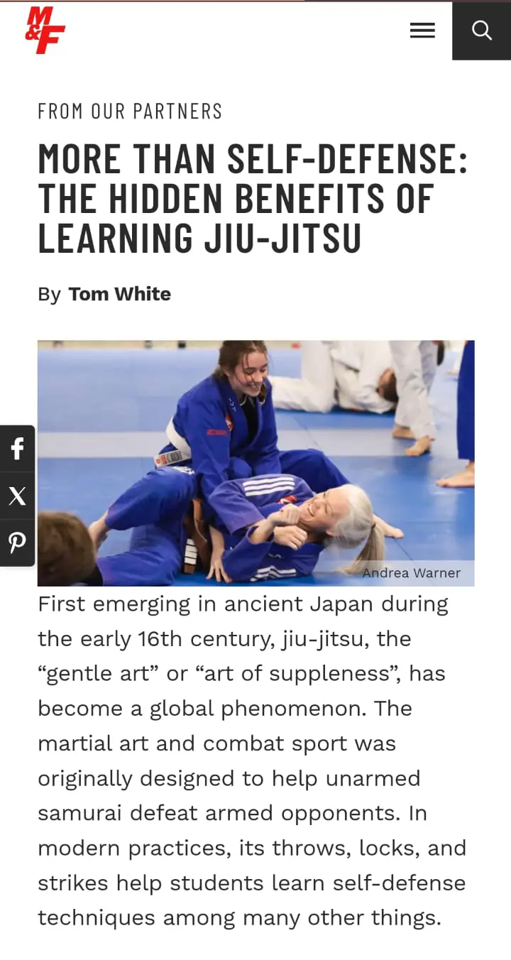 Two students drilling a Brazilian Jiu-Jitsu technique at Gracie Barra Riverton