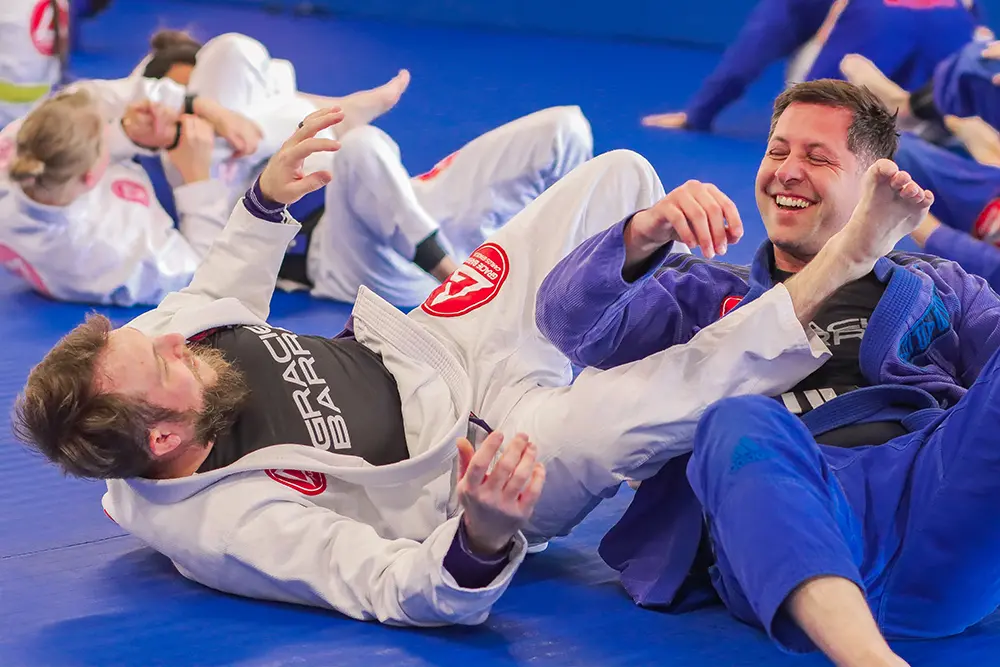 Students training together on the mats at Gracie Barra Riverton