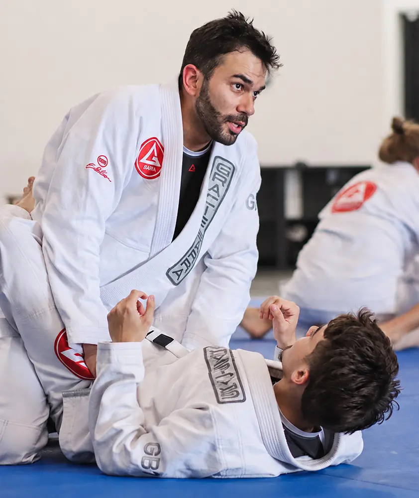 Adult beginners training Brazilian Jiu-Jitsu at Gracie Barra Riverton